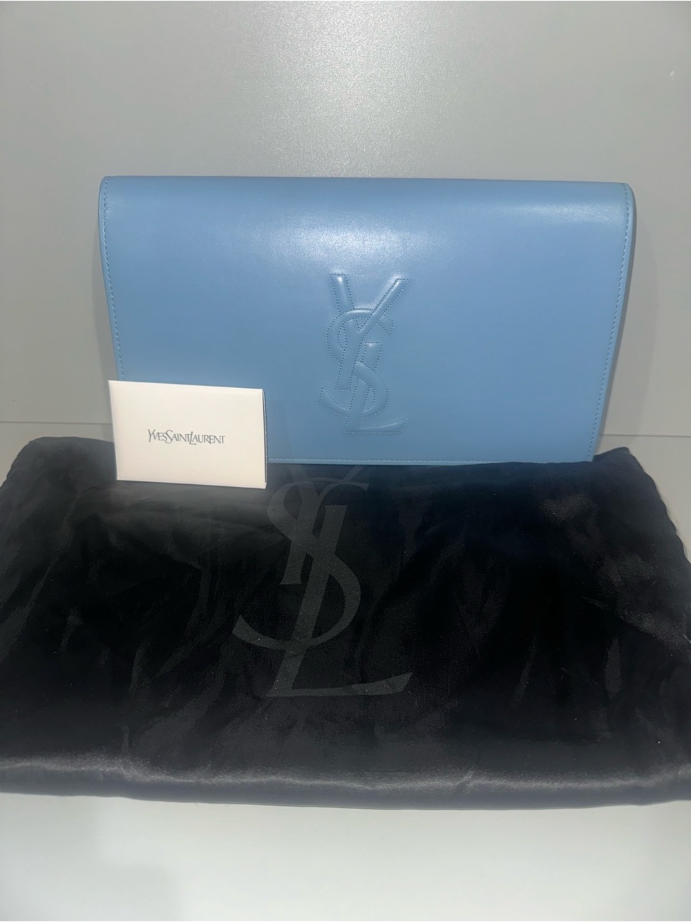 Saint Laurent Sky Blue Leather Clutch with Embossed YSL